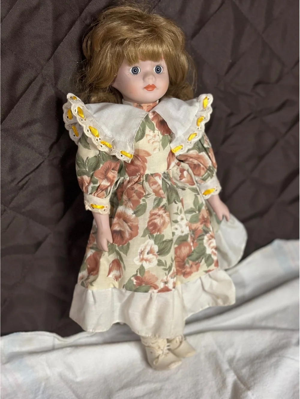 Vintage Porcelain Doll with Floral Dress and Lace Trim